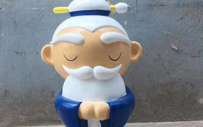 商業(yè)街?jǐn)[放玻璃鋼卡通老人公仔雕塑