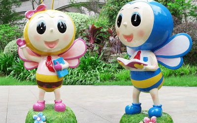 公園小區(qū)廣場擺拿書玻璃鋼卡通蜜蜂雕塑